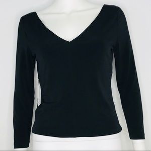 Black v-neck 3/4 sleeve top.